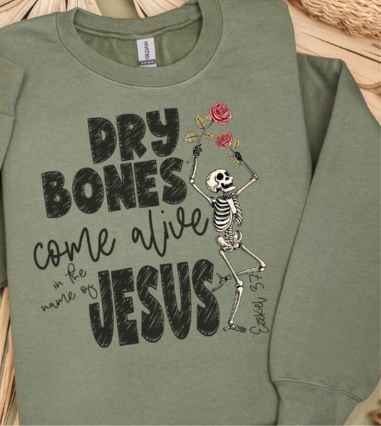 Green sweatshirt with skeleton and rose design and text on a woven surface