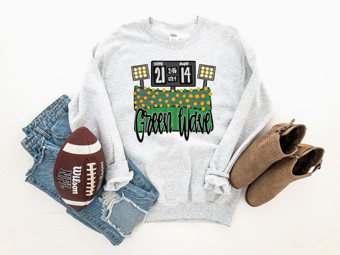 White sweatshirt with sports-themed design, football, jeans, and boots on a white background