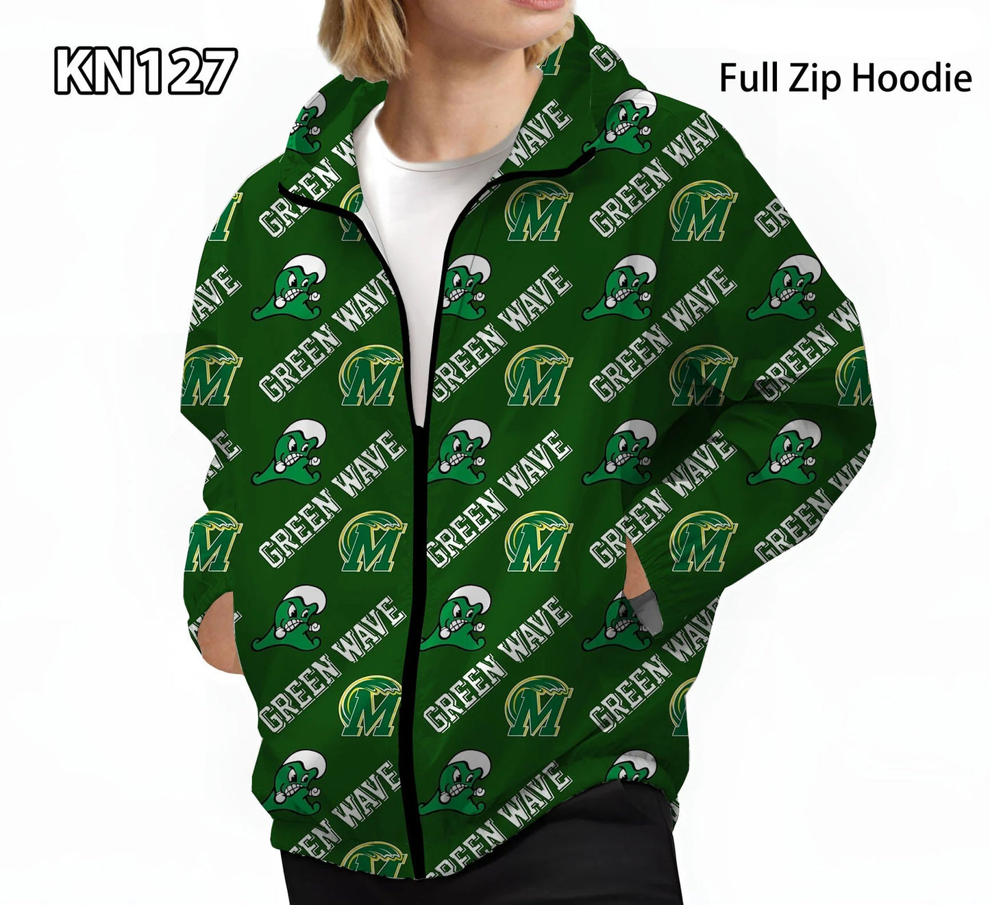 A person wearing a green full-zip hoodie with an all-over repeating 'Green Wave' logo pattern. The hoodie features a dark green base with white text and green/yellow graphic logos.