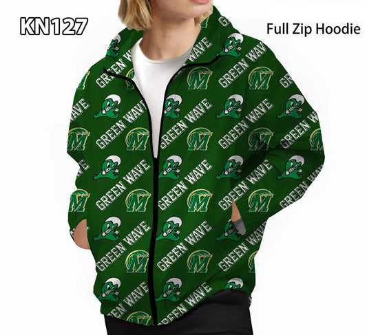 A person wearing a green full-zip hoodie with an all-over repeating 'Green Wave' logo pattern. The hoodie features a dark green base with white text and green/yellow graphic logos.
