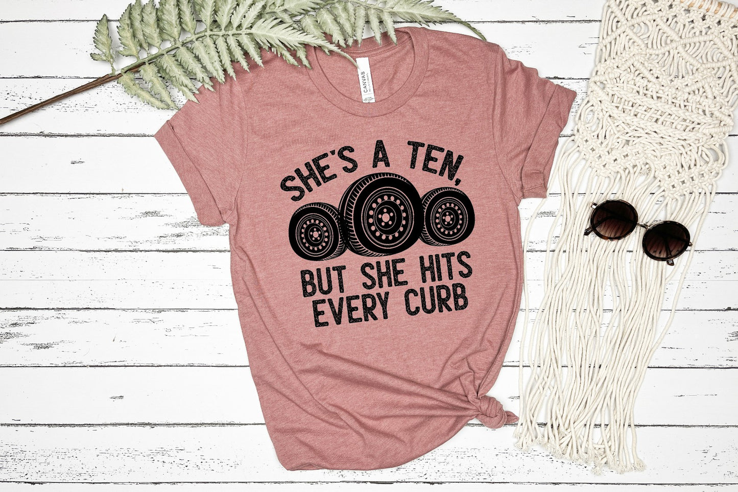 She's a 10 but she hits every curb T-shirt