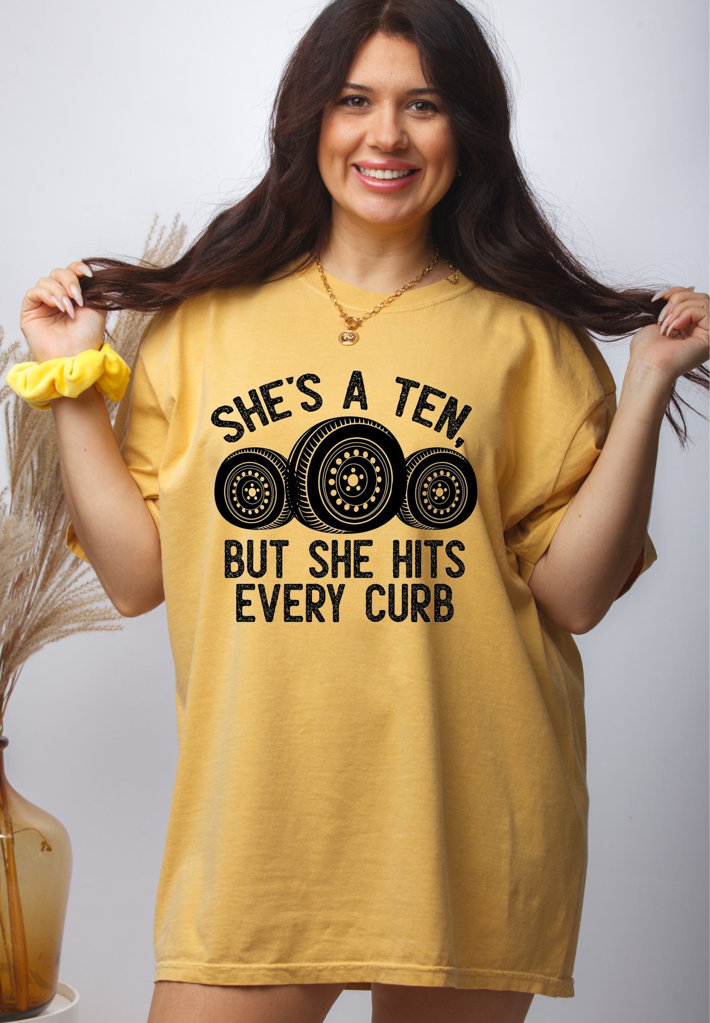 She's a 10 but she hits every curb T-shirt