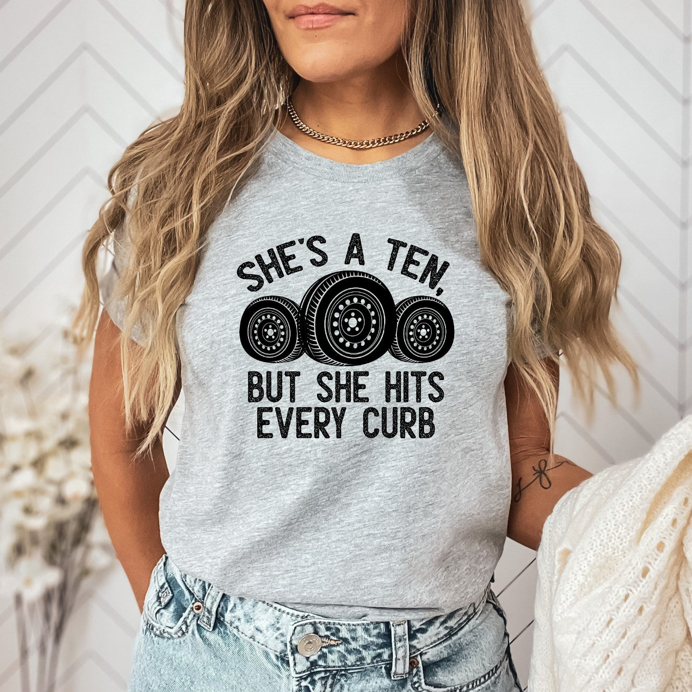 She's a 10 but she hits every curb T-shirt