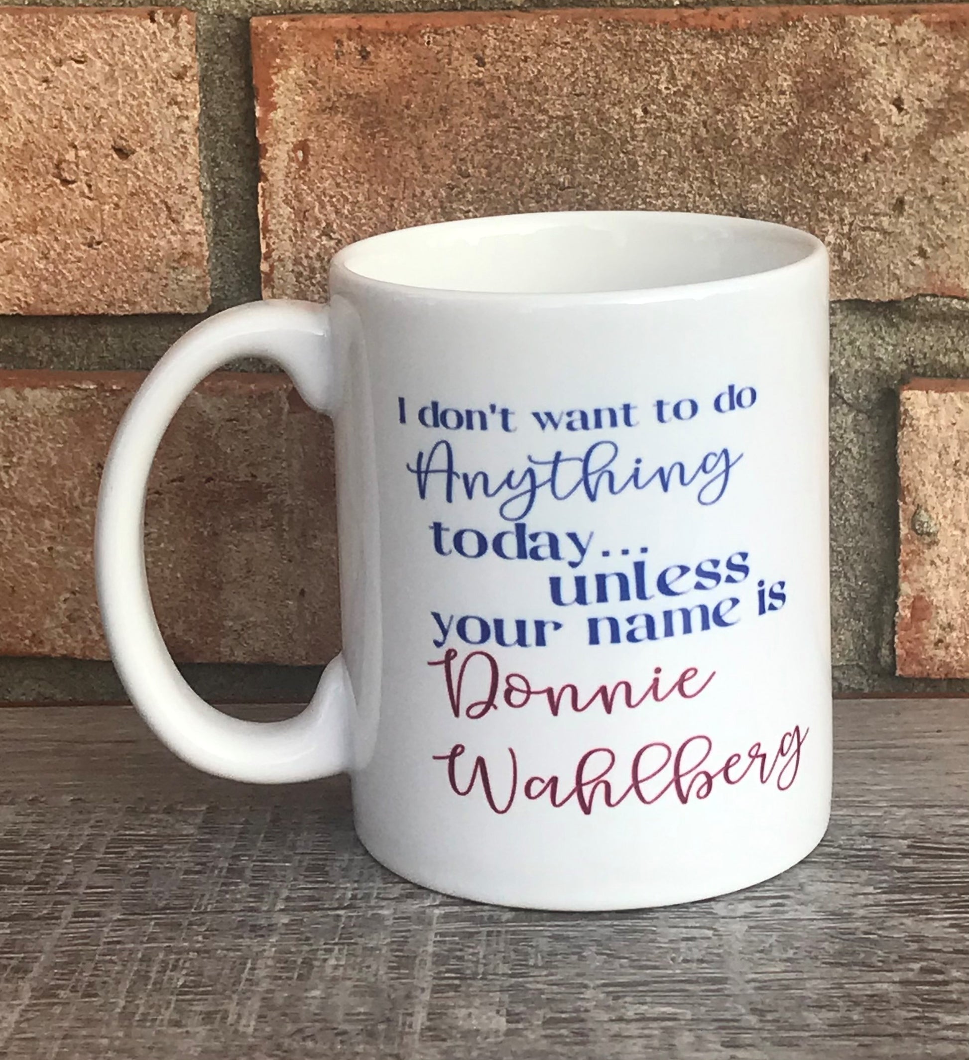 White mug with text reading I don't want to do anything today unless your name is Donnie Wahlberg 