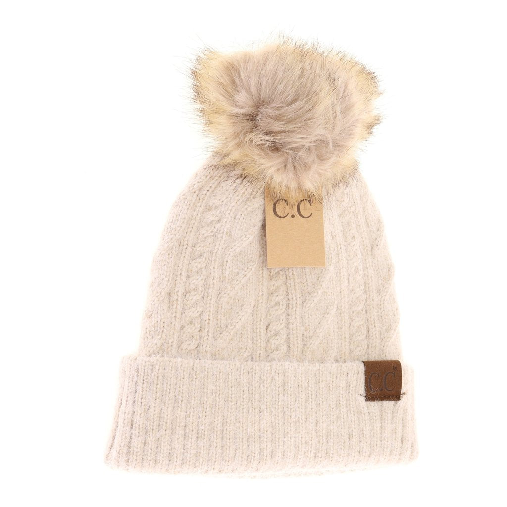 Soft cuffed cable knit C.C. Beanie with fur Pom